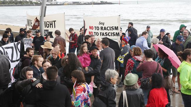 Activists arrive for their anti-racism counter-rally. Picture: David Crosling/AAP