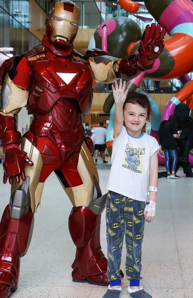 RCH patient Ryder Walker, 5, with Iron Man. Picture: Ian Currie