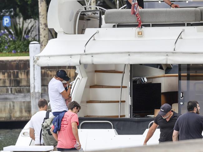 Dad and bub dressed in nautically appropriate matching navy and white outfits. Picture: Media-Mode