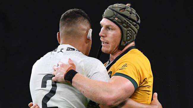 Fiji's Samuel Matavesi and Australia’s David Pocock after the match. Picture: AFP