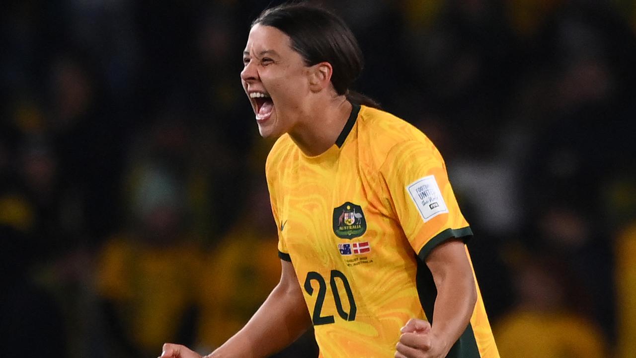 Australia's forward #20 Sam Kerr celebrates at the end of the Australia and New Zealand 2023 Women's World Cup round of 16 football match between Australia and Denmark at Stadium Australia in Sydney on August 7, 2023. (Photo by FRANCK FIFE / AFP)