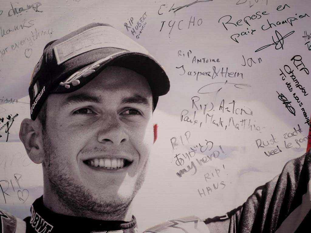 A portrait of BWT Arden's French driver Anthoine Hubert covered with condolence messages at the entrance of the Spa-Francorchamps circuit.