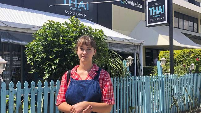 Tugun local Vivi Baker, 18, was one of the many hospitality staff laid off as a consequence of the government's coronavirus restrictions on restaurants. She is pictured here outside Currumbin Centrelink Photo: Jessica Lamb. Picture: Jessica Lamb