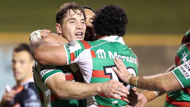 SYDNEY, AUSTRALIA - JULY 04: Cameron Murray of the Rabbitohs celebrates with team-mates after scoring a try during the round 16 NRL match between the Wests Tigers and the South Sydney Rabbitohs at Leichhardt Oval on July 04, 2021, in Sydney, Australia. (Photo by Mark Kolbe/Getty Images)