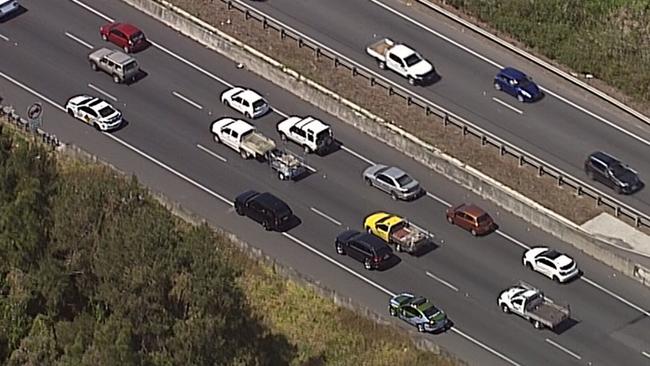 His Royal Highness Prince Andrew Duke of York's convoy on the shoulder of the M1 to beat gridlock. Photo: 9 News