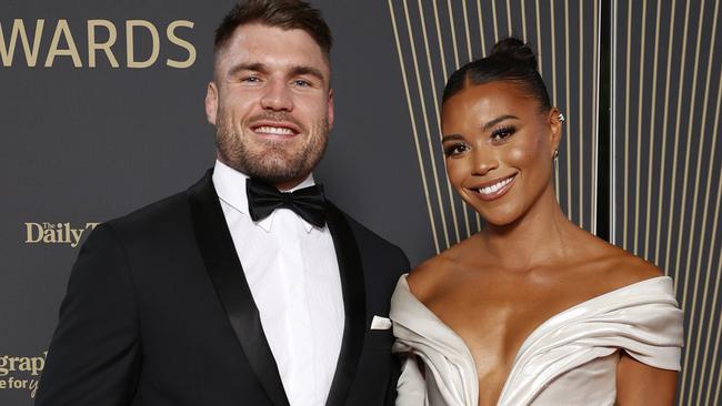 DAILY TELEGRAPH SEPTEMBER 28, 2022. Angus Crichton and Morgan Mitchell on the red carpet for the 2022 Dally M Awards, held at Royal Randwick Racecourse. Picture: Jonathan Ng