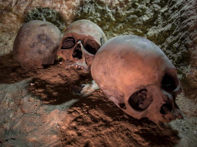 epaselect epa06560939 Skulls are seen at a recently found ancient Egyptian cemetery, in Minya province, 245 km south of Cairo, Egypt, 24 February 2018. According to the Ministry of Antiquities, an ancient Egyptian cemetery was discovered six kilometers north of Tuna al-Gabal archaeological site in Minya, containing a number of burial shafts dating to the late pharaonic period and early Ptolemaic era. The archaeological mission unearthed a mummy decorated with a bronze collar, 1000 figurines, some 40 sarcophagi, four canopic jars, and other funerary items.  EPA/IBRAHIM YOUSSEF