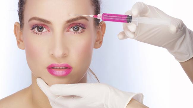 Portrait of fresh and beautiful woman getting botox injection