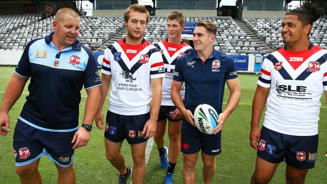 Mark O'Meley and Connor Watson, with young Central Coast Rooster players Tyson James, Harrison Edwards and Mokena Moeke, at Central Coast Stadium, Gosford. Picture: Peter Clark