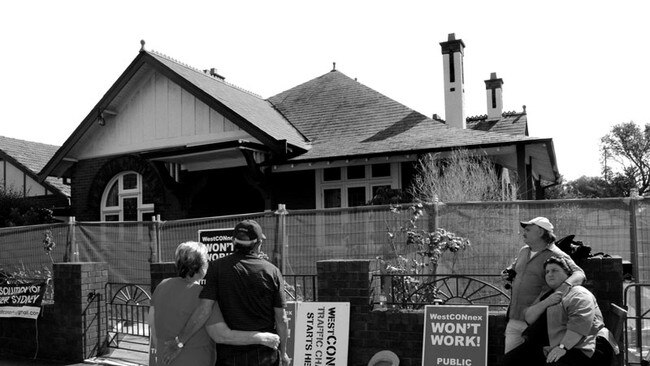 The former residents of this house at Haberfield look on as preparations continue for demolition in 2016. Picture: Michael Bianchino