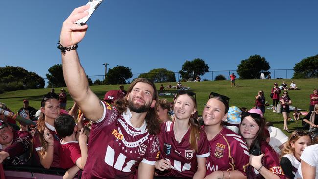 Pat Carrigan takes a selfie with Queensland fans. Picture Lachie Millard