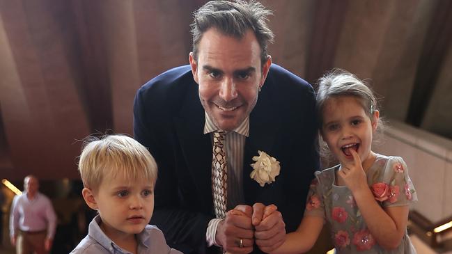 Oscar Humphries with his children attend the State Memorial for Barry Humphries. Picture: Brendon Thorne/Getty Images)