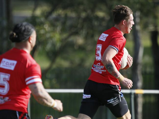 Lochlan Marshall races away to score for St Clair. Picture Warren Gannon Photography