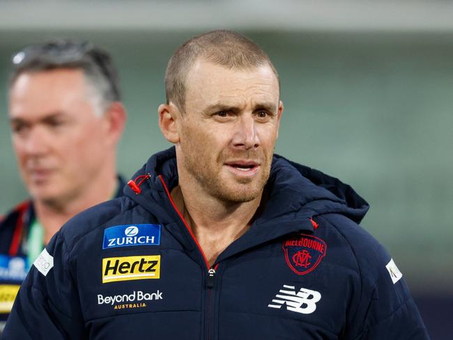 MELBOURNE, AUSTRALIA - MAY 04: Simon Goodwin, Senior Coach of the Demons is seen at three quarter tie during the 2024 AFL Round 08 match between the Melbourne Demons and the Geelong Cats at The Melbourne Cricket Ground on May 04, 2024 in Melbourne, Australia. (Photo by Dylan Burns/AFL Photos via Getty Images)