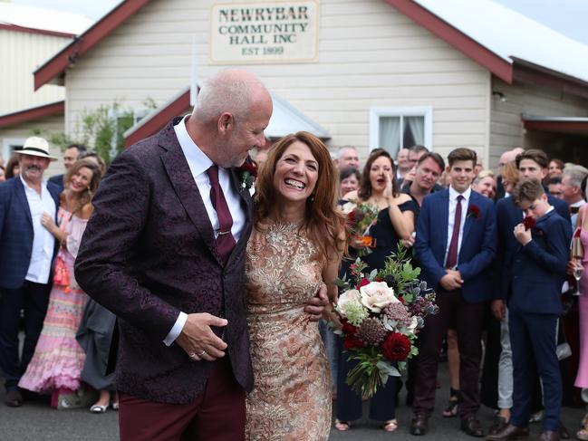 Robin Bailey and Sean Pickwell marry at Newrybar Community Hall, NSW. Picture: Liam Kidston