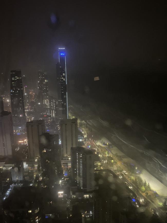 The view from the 65th floor of the Q1 tower in Surfers Paradise where resident Joanie Foster says it is "rocking and rolling" in the Friday night Cyclone Alfred winds