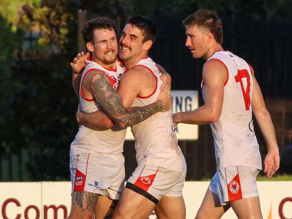 Jayden Magro (left) celebrates a goal against Darwin Buffaloes in Round 10. Picture: Celina Whan / AFLNTMedia.