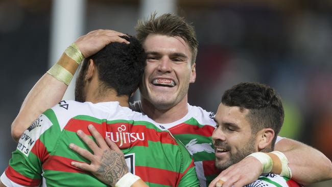 Alexander Johnston of the Rabbitohs scores and celebrates with Angus Crichton and Adam Reynolds during the Round 15 NRL match between the Parramatta Eels and the South Sydney Rabbitohs at ANZ Stadium in Sydney, Thursday, June 14, 2018. (AAP Image/Craig Golding) NO ARCHIVING, EDITORIAL USE ONLY