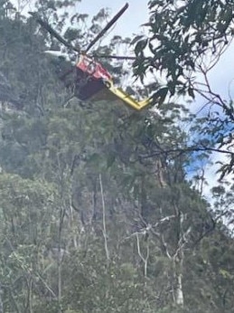 An hours-long mission to recover a man who has fallen from a cliff in the Gold Coast hinterland is still underway. Picture: Queensland Ambulance Service