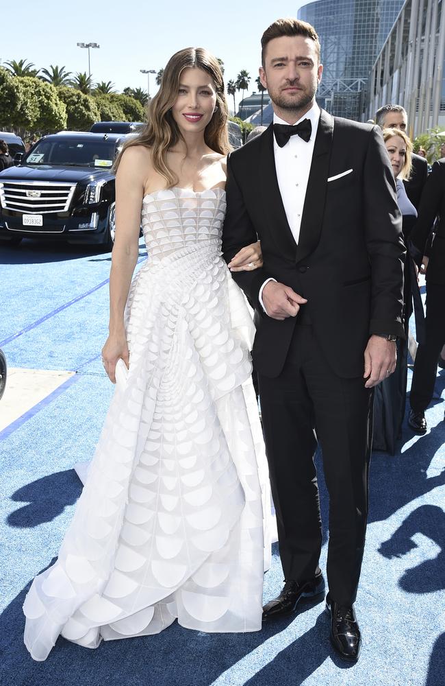 Lotta ladies in white this year. Here’s Jessica Biel and Justin Trousersnake — sorry, Timberlake. Picture: AP