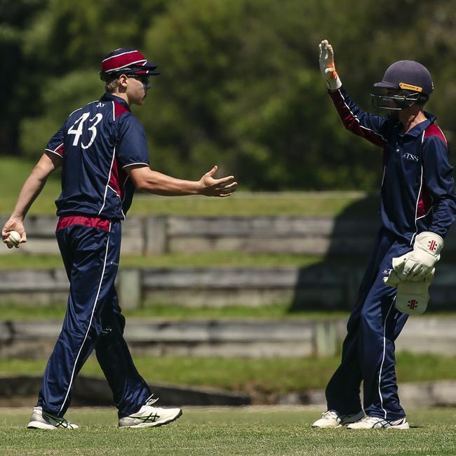 TSS First 11 celebrate the 2nd BHS wicket of Callum McCatthy, caught behind as The Southport School v Brisbane State High School at The Southport School/Village Green. Picture: Glenn Campbell