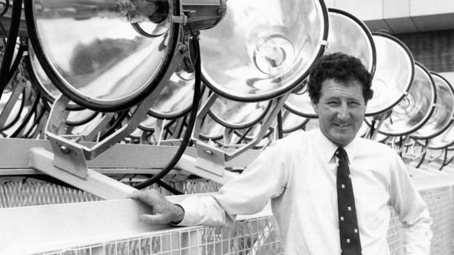 SANFL general manager and former footballer Don Roach with the lights at Football Park in December 1983.