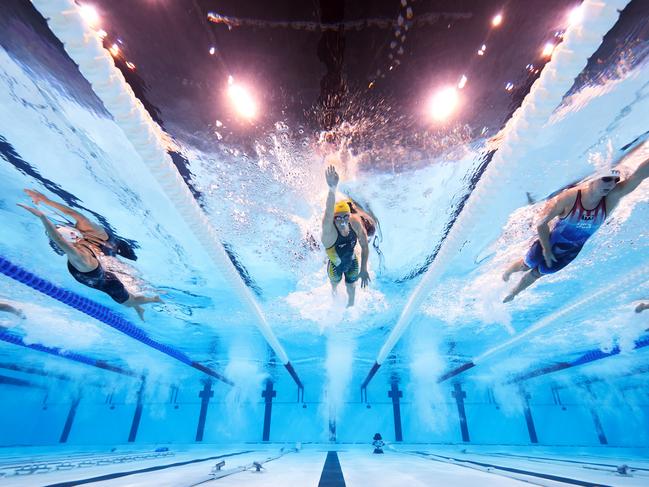 Paige Madden of Team United States, Ariarne Titmus of Team Australia and Katie Ledecky of Team United States compete in the Women's 800m Freestyle Heats. Picture: Adam Pretty/Getty Images