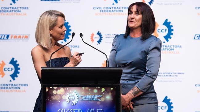 Evonne Penrose accepts her CCF SA Industry &amp; Training award last year from Jess Adamson. Picture: Civil Contractors Federation SA