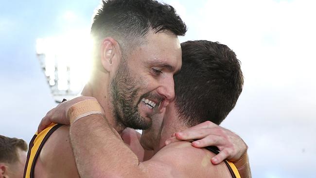 MELBOURNE, AUSTRALIA - JUNE 01: Jack Gunston of the Hawks hugs Luke Breust of the Hawks after winning the round 12 AFL match between Hawthorn Hawks and Adelaide Crows at Melbourne Cricket Ground, on June 01, 2024, in Melbourne, Australia. (Photo by Quinn Rooney/Getty Images)