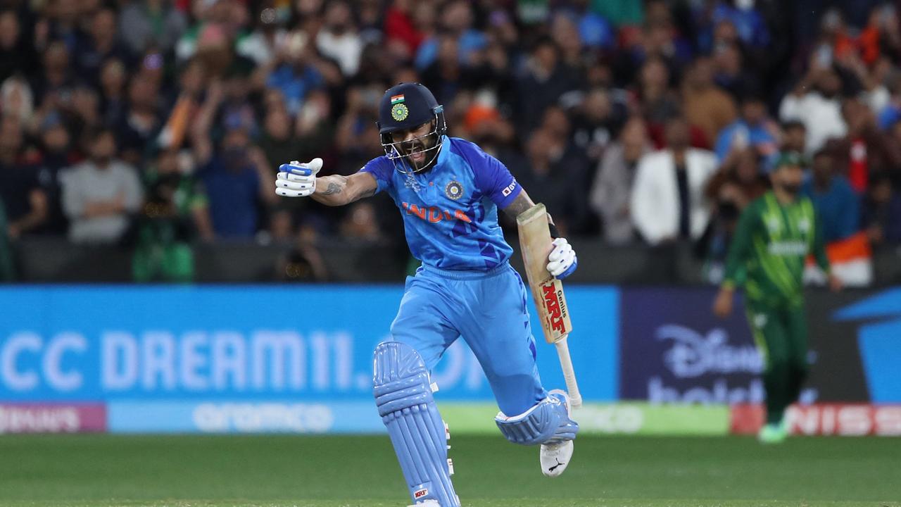 India's Virat Kohli celebrates after their win during the ICC men's Twenty20 World Cup 2022 cricket match between India and Pakistan at Melbourne Cricket Ground (MCG) in Melbourne on October 23, 2022. (Photo by Surjeet YADAV / AFP) / -- IMAGE RESTRICTED TO EDITORIAL USE - STRICTLY NO COMMERCIAL USE --