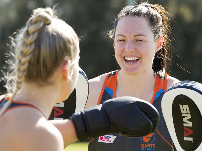 Giants net ballers Jamie-Lee Price (blonde) and Sam Poolman during a boxing session pictured at Giants AFL headquarters , Homebush.  Pic Jenny Evans