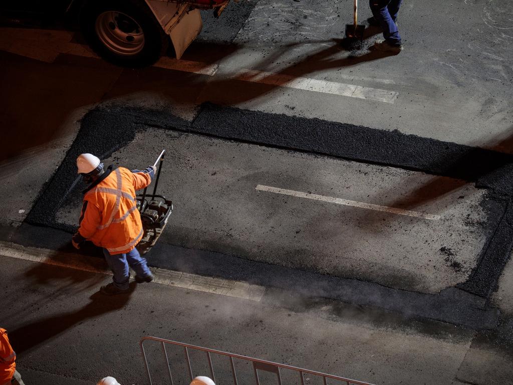 Mike Parr art installation for Dark Mofo: He his buried under Macquarie St Hobart. Picture: DARK MOFO