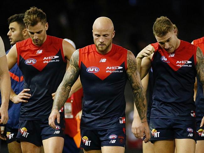 AFL: Round 6 Melbourne v St Kilda at Etihad Stadium, 30th April Melbourne Australia. Melbourne's Nathan Jones leads the team off after the loss. Picture : George Salpigtidis