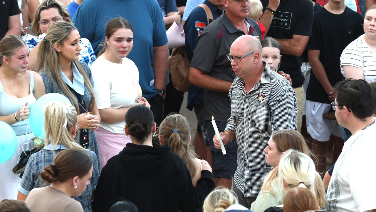 Hundreds of people have gathered at Bribie Island for a vigil to honour 17-year-old shark attack victim Charlize Zmuda. Picture: David Clark