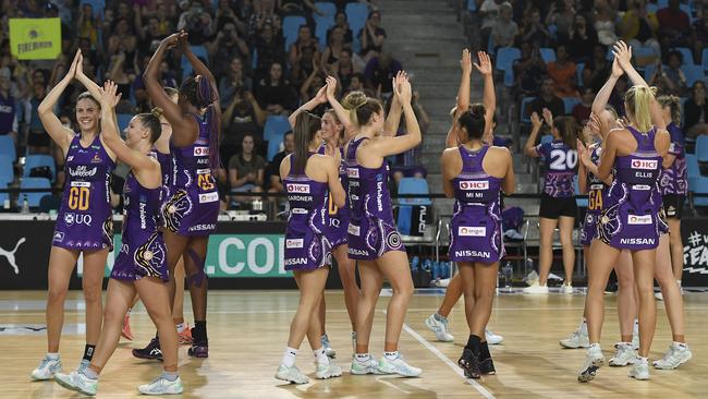 CAIRNS, AUSTRALIA – SEPTEMBER 20: The Firebirds celebrate after winning the round 13 Super Netball match between the Melbourne Vixens and the Queensland Firebirds at the Cairns Pop Up Arena on September 20, 2020 in Cairns, Australia. (Photo by Ian Hitchcock/Getty Images)