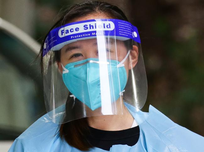 SYDNEY, AUSTRALIA - NewsWire Photos DECEMBER 28, 2020.  A Nurse is seen working at the Warringah Aquatic Centre Pop-up Drive-through  Covid-19 Testing site in Sydney Australia. Picture: NCA NewsWire / Gaye Gerard