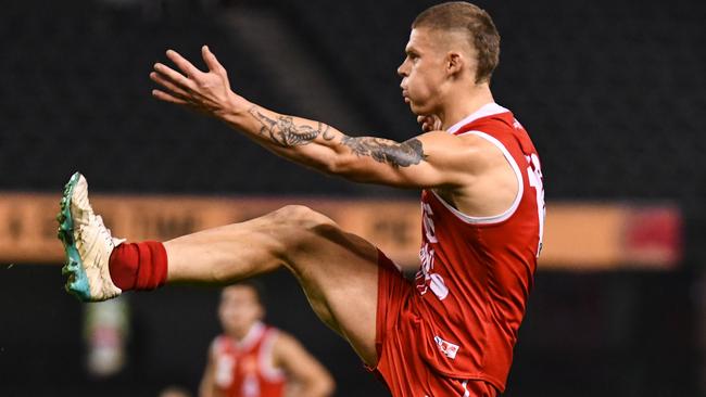 Tynan Smith kicks for goal for Northern Bullants. Picture: Nathan McNeill
