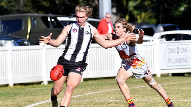 Action from the QAFL colts game between Sherwood and Noosa