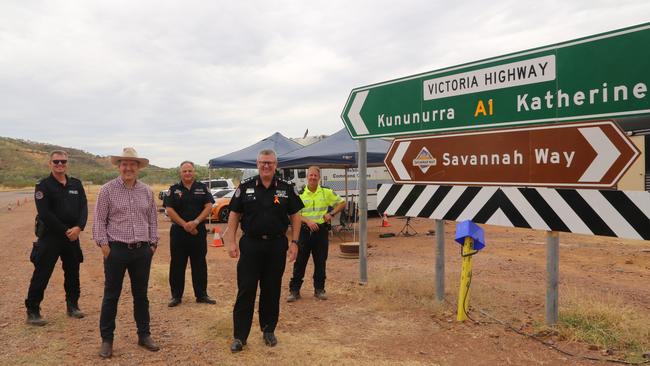 Chief Minister Michael Gunner with NT Police Commissioner Jamie Chalker (right), NT Police Constable Clinton Richardson (back right) checking on the NT's border control.