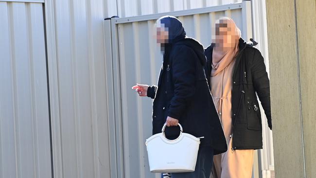 The alleged mastermind of the scheme outside her home with a friend. Picture: Jeremy PiperJeremy Piper