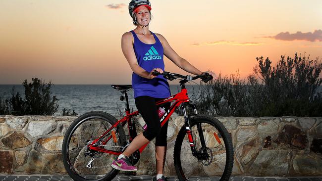 CHANGE: Cyclist Christine Mason feels safer riding on paths like the Esplanade at Henley Beach. Picture: BIANCA DE MARCHI