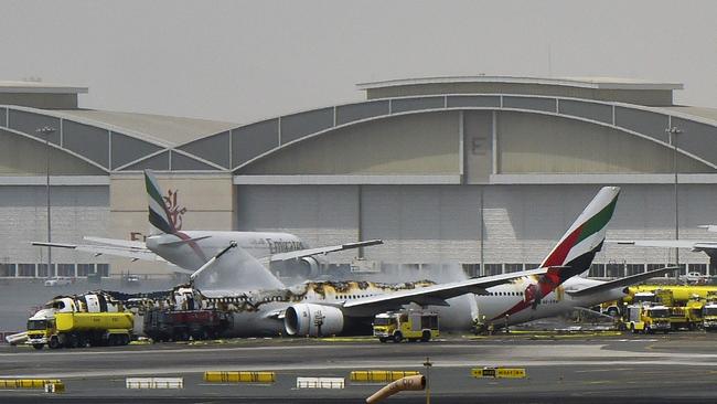 The burnt out remains of an Emirates’ Boeing 777-300 after crash landing in Dubai. Picture: AFP / Ahmed Ramzan