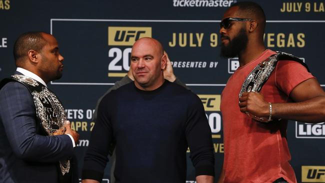 UFC president Dana White stands between Daniel Cormier (L) and Jon Jones before UFC 200.