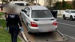 A car is seized as part of arrests over the shooting of Sam Abdulrahim. Picture: Victoria Police