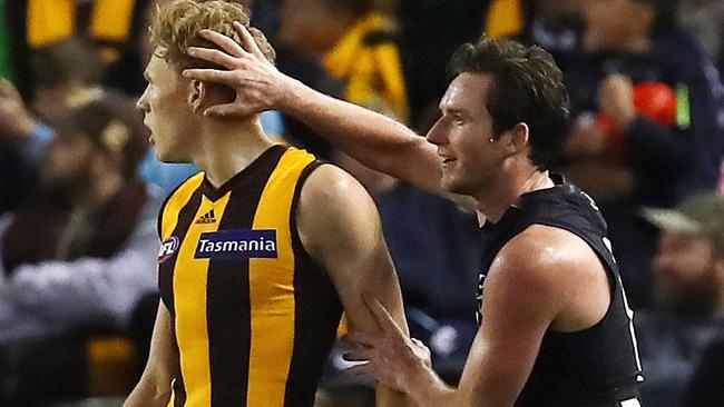 Carlton's Jed Lamb gives Hawthorn's James Sicily a rub on the head after kicking a third-quarter goal. Pic: Michael Klein