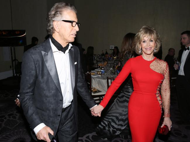 Richard Perry and Jane Fonda in the crowd before Perry passed out.