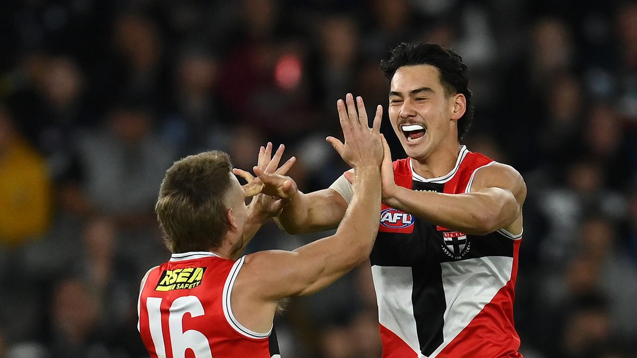 MELBOURNE, AUSTRALIA - APRIL 23: Mitch Owens of the Saints is congratulated by Dan Butler after kicking a goal during the round six AFL match between Carlton Blues and St Kilda Saints at Marvel Stadium, on April 23, 2023, in Melbourne, Australia. (Photo by Quinn Rooney/Getty Images)