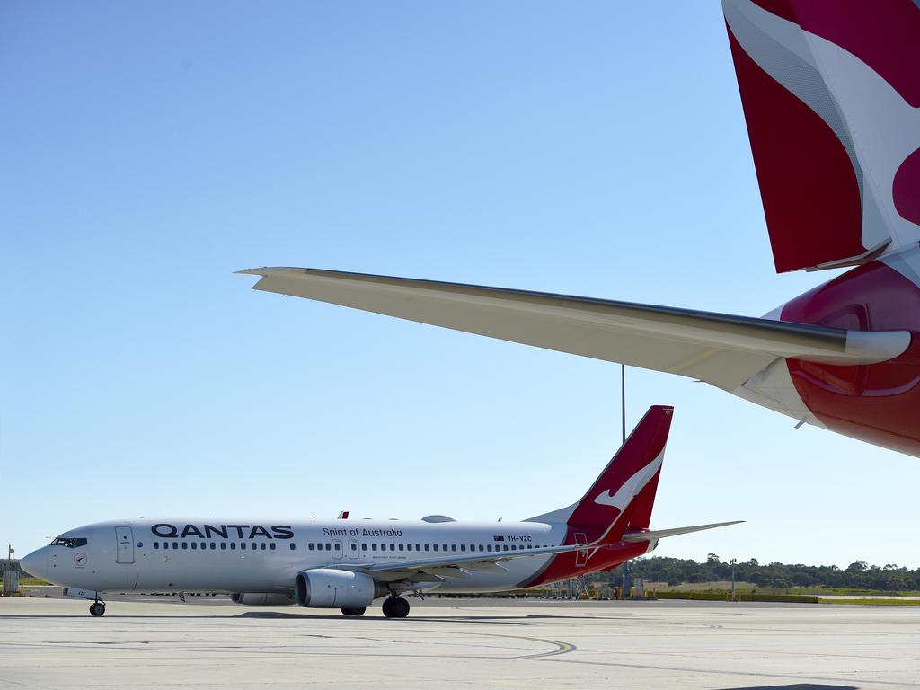 Masks on flights could soon be a thing of the past, Qantas says. Picture: Andrew Henshaw