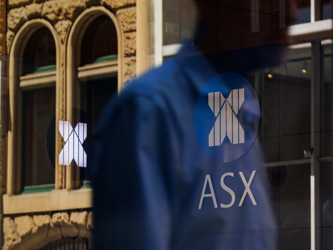 SYDNEY, AUSTRALIA - NewsWire Photos, October 29 2024. GENERIC. Stocks. Finance. Economy. People walk past the Australian Stock Exchange, ASX, on Bridge Street. Picture: NewsWire / Max Mason-Hubers