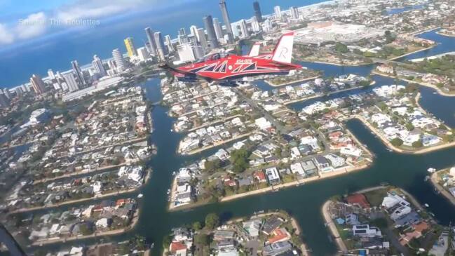 The Roulettes fly over the Gold Coast beachfront in a training run